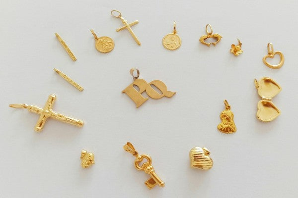 Choosing Gold Charms for Necklaces Based on Meaning and Symbolism