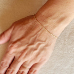 Gold .5mm Box Chain Bracelet, Size 7 in.